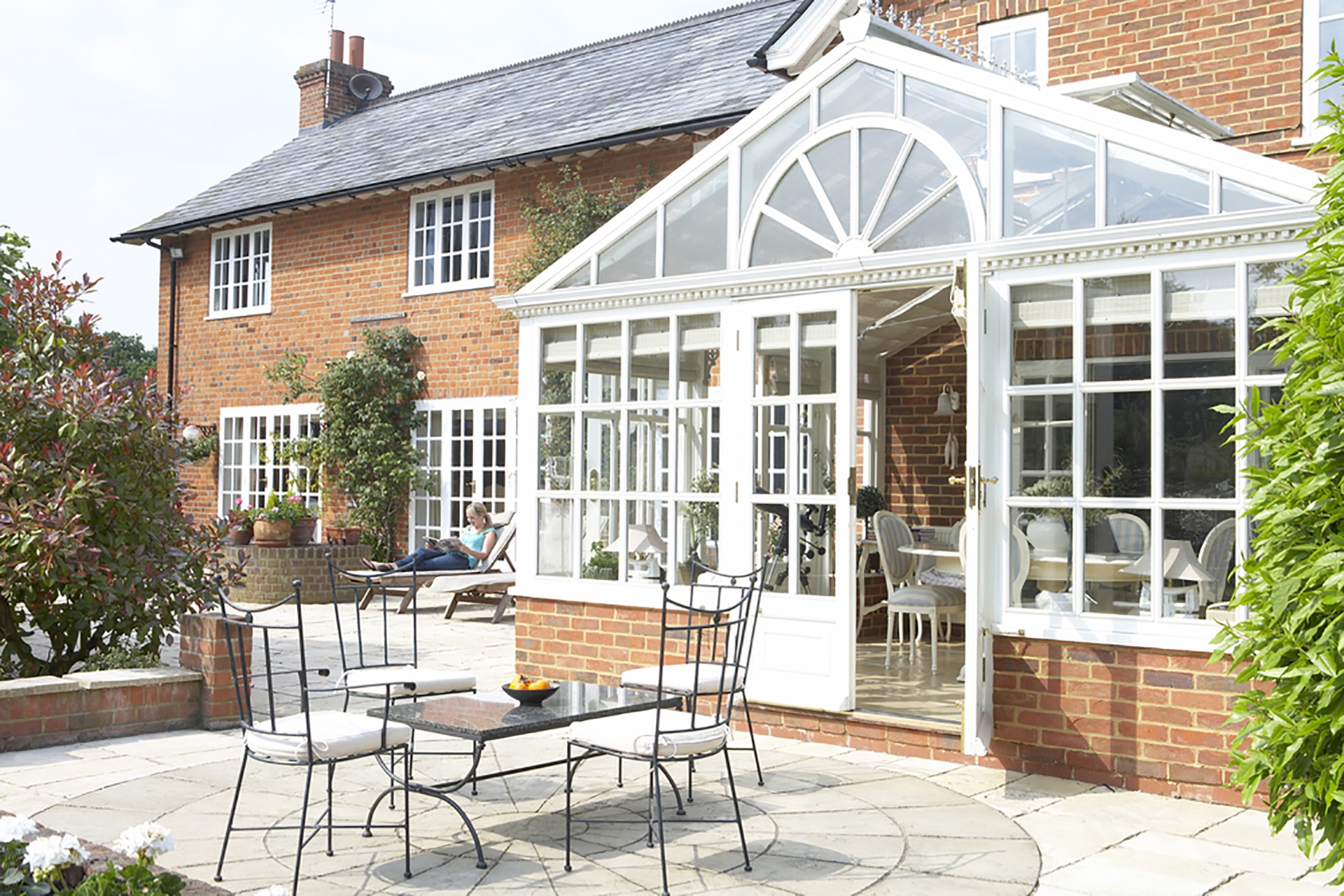 Gable conservatory style in a large cottage-style home.