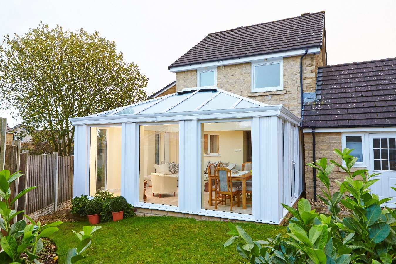 White conservatory with solid roof