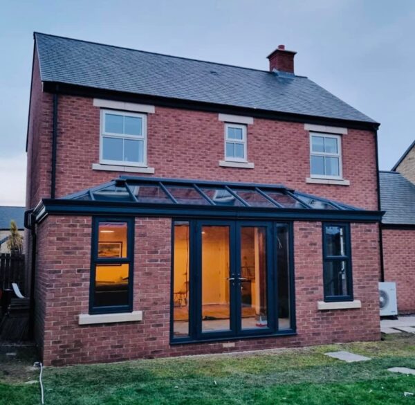 Modern brick orangery with black fittings